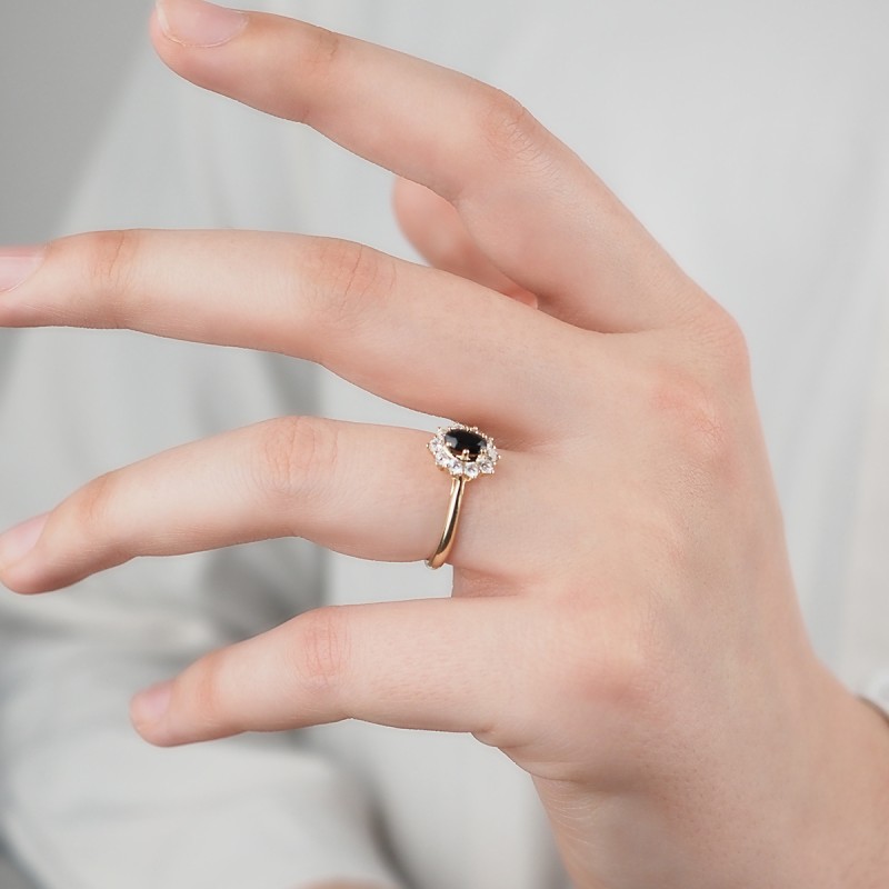 Bague solitaire accompagné Saphir et or jaune 375/000