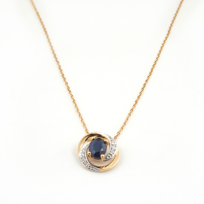 Collier Pendentif  Carador en or jaune 375/000, saphir et oxydes de zirconium