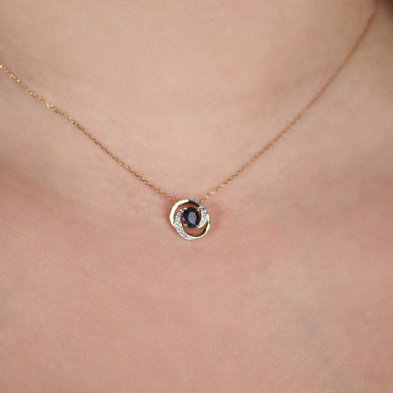 Collier Pendentif  Carador en or jaune 375/000, saphir et oxydes de zirconium