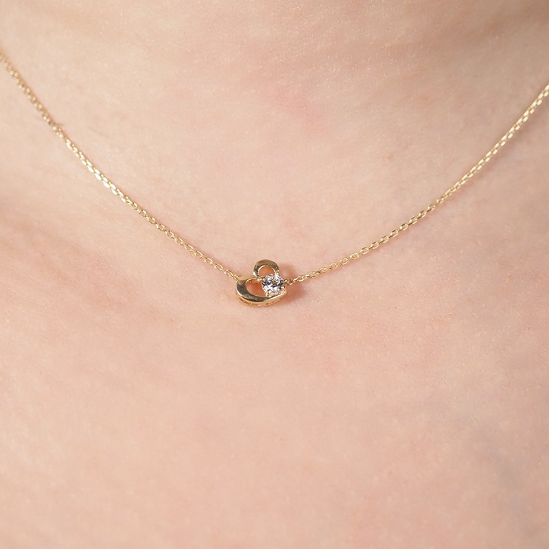 Collier pendentif Carador or jaune 375/000e signe coeur