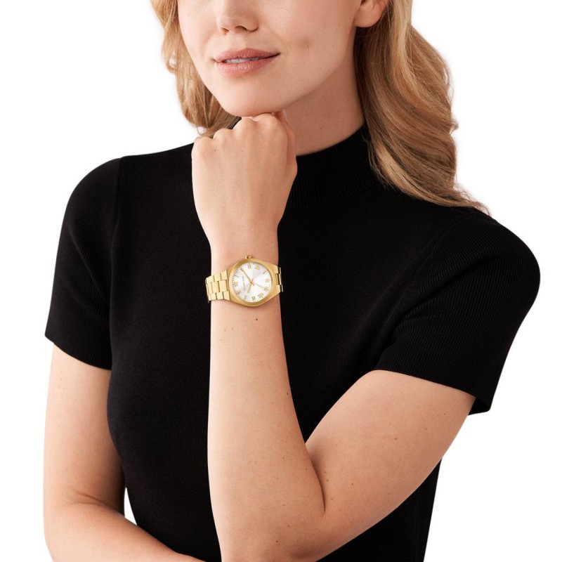 Montre Michael Kors femme doré fond blanc