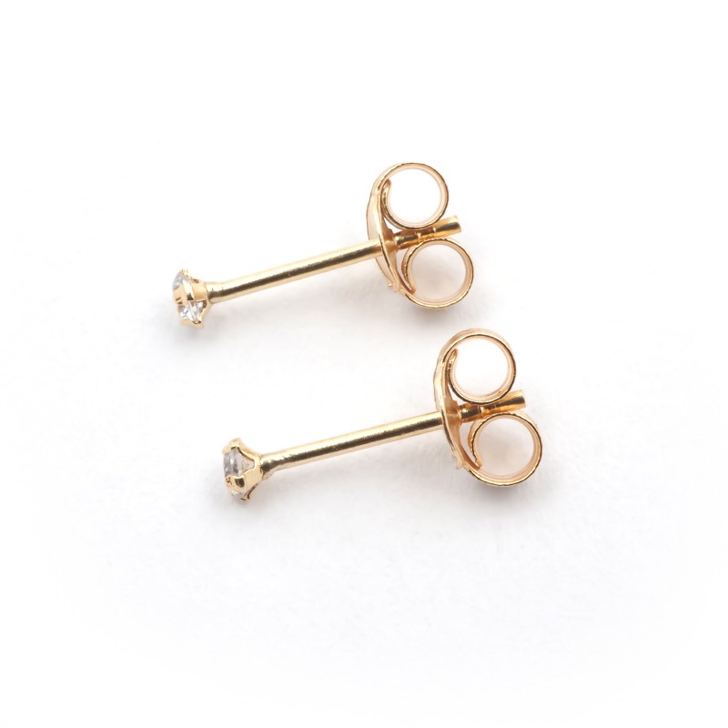 Boucles d'oreilles clous Carador or jaune 375/000 et oxyde de zirconium serti 4 griffes