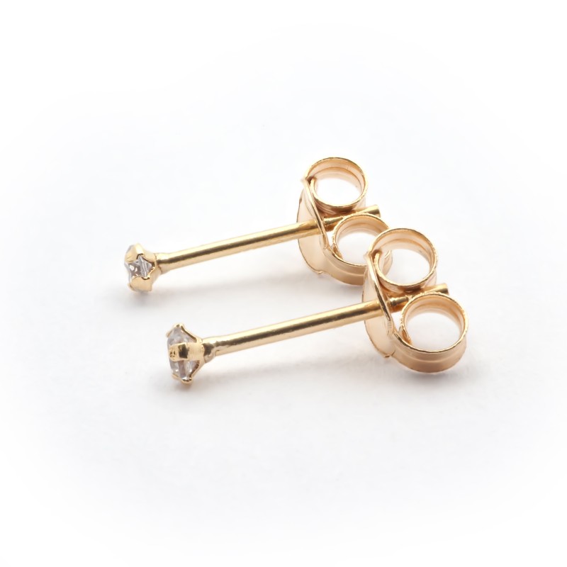 Boucles d'oreilles clous Carador or jaune 375/000 et oxyde de zirconium serti 4 griffes
