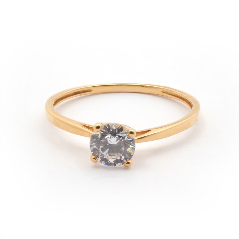 Bague solitaire  Carador en or jaune 375/000 et oxydede zirconium serti 4 griffes