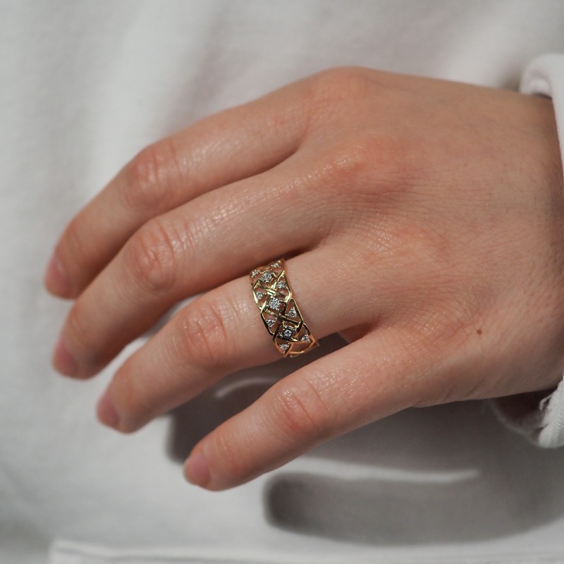 Bague résille Carador en or jaune 750/000 et diamants