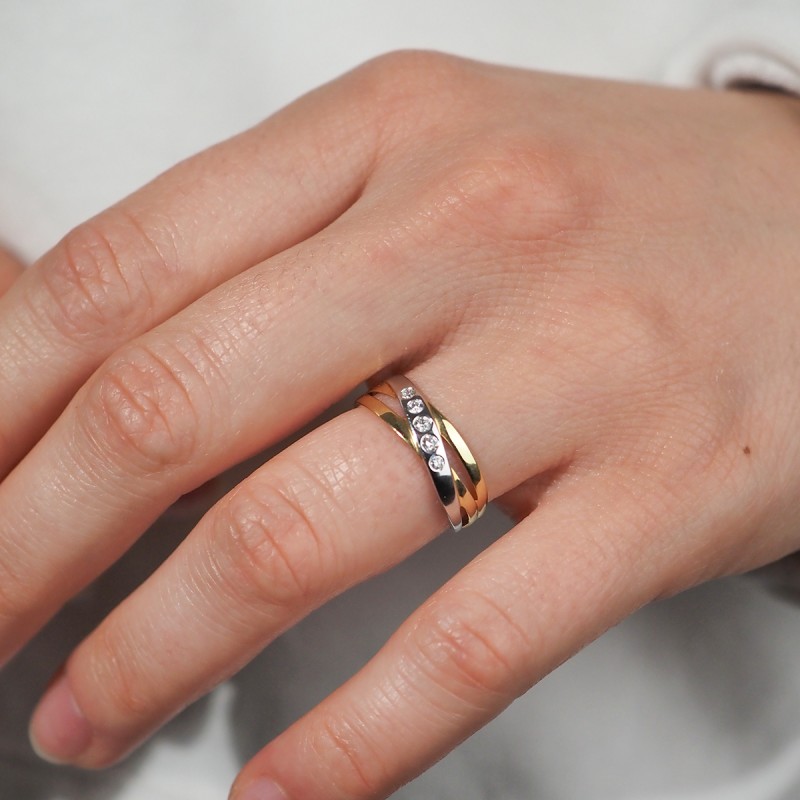 Bague Carador liens croisées or blanc et jaune 750/000 et diamants sertis clos