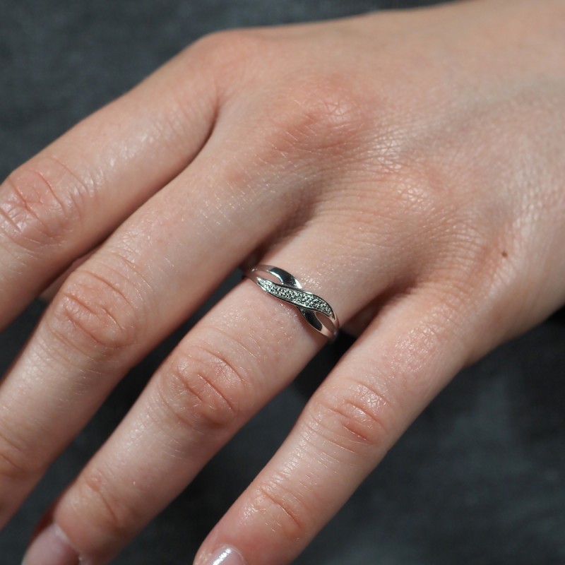 Bague fantaisie femme carador en or blanc 750/000 et diamants motif signe infini