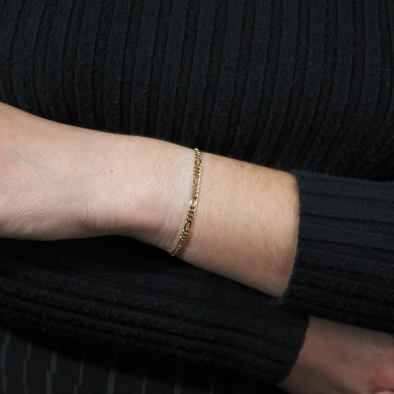 Bracelet en or jaune 750/000 maille cheval alternée ultra plate CARADOR