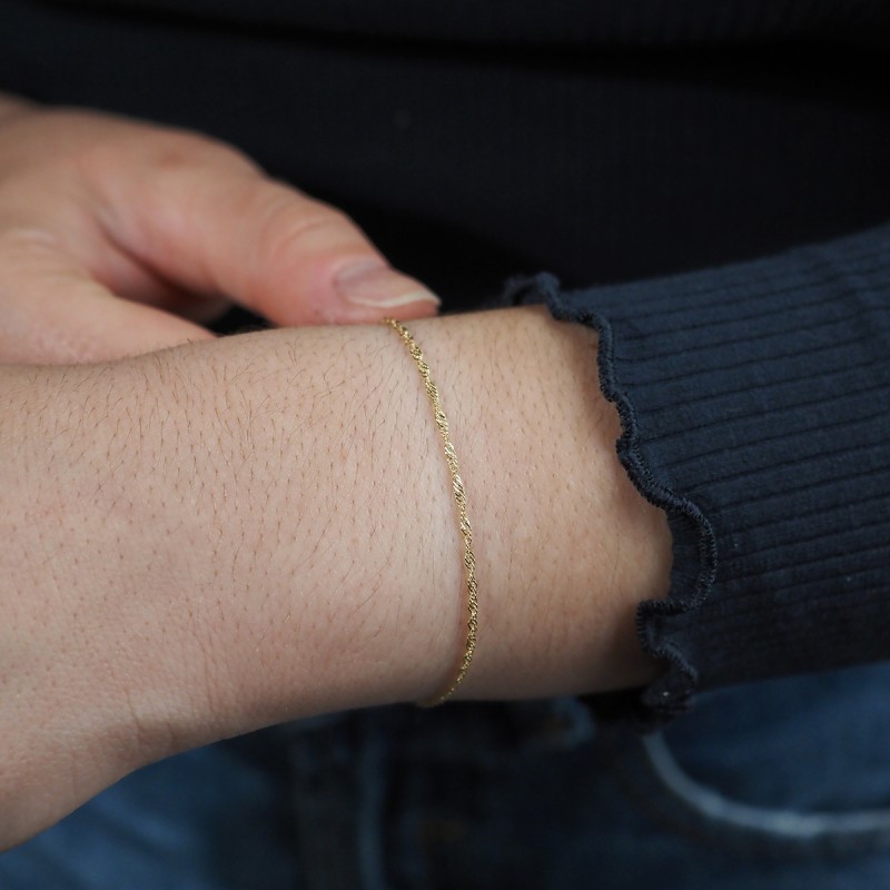 Bracelet en or jaune 750/000 maille singapour CARADOR