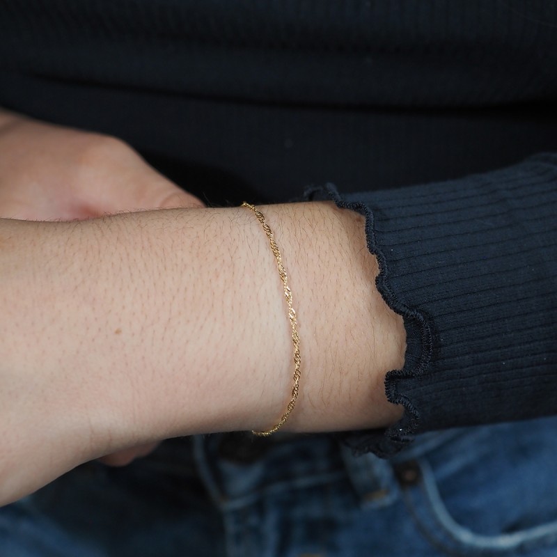 Bracelet CARADOR maille singapour or jaune 750/000