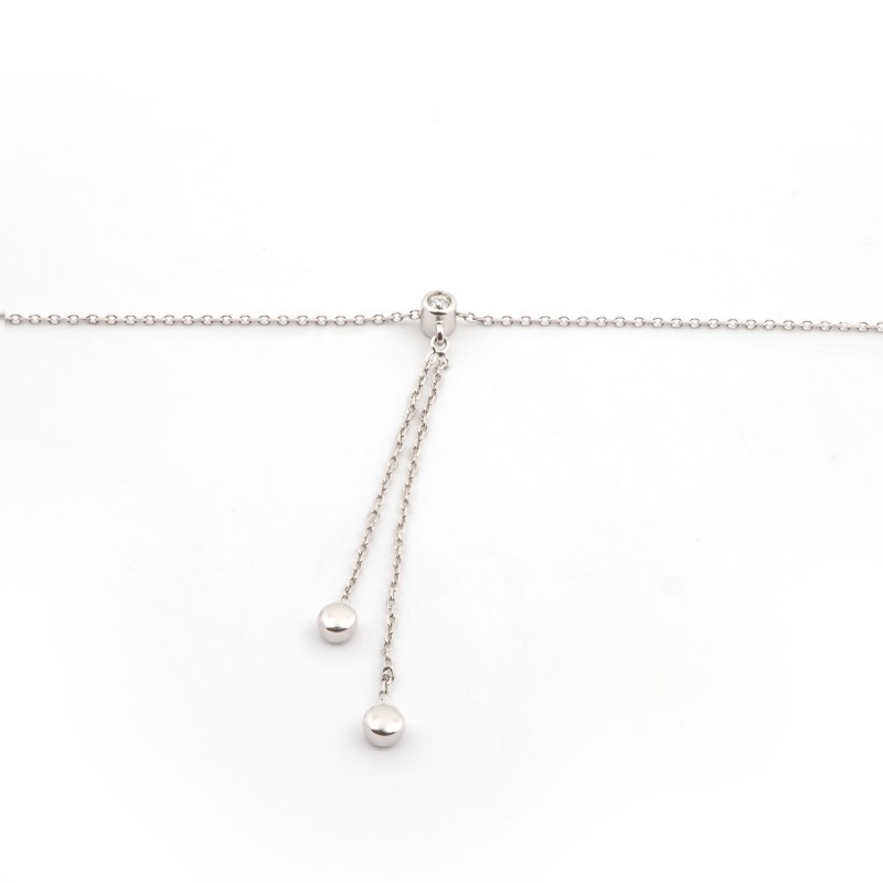 Collier Minimaliste deux boules Carador en or blanc 750/000 et diamant