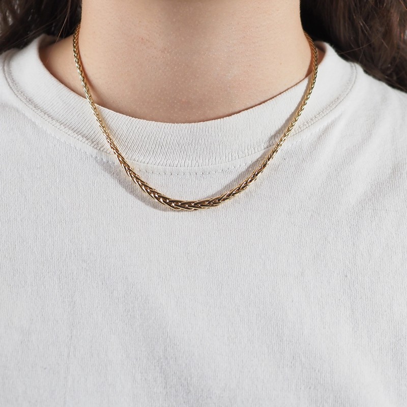 Collier or jaune 750/000 CARADOR en maille palmier fine et large
