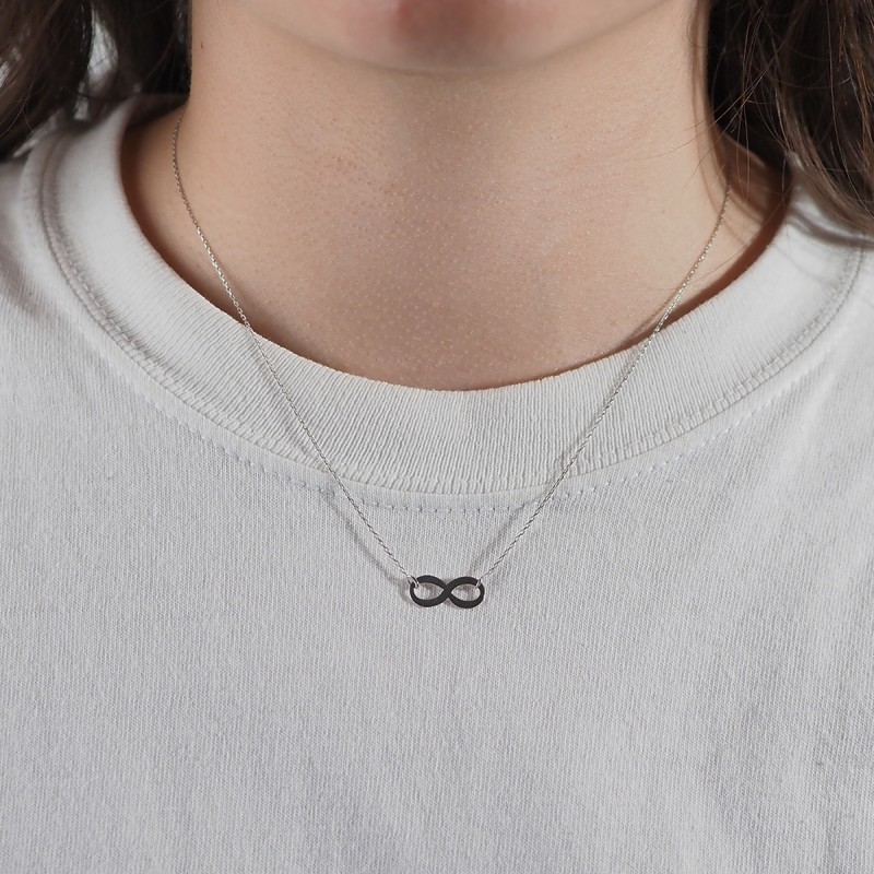 Collier INFINI en or blanc 750/000 CARADOR