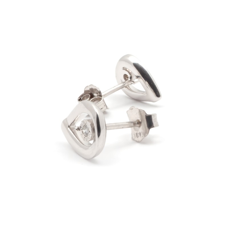 Boucles d'oreilles en or blanc 750/000 CARADOR diamants.