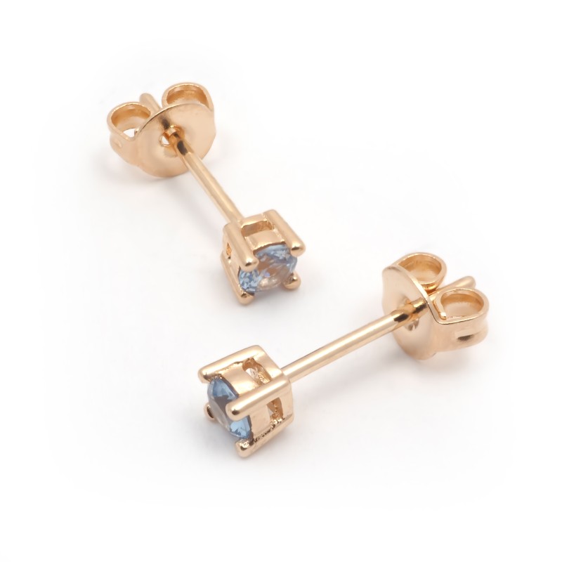 Boucles d'oreilles clous solitaires femme carador en plaqué or et spinelle bleu clair