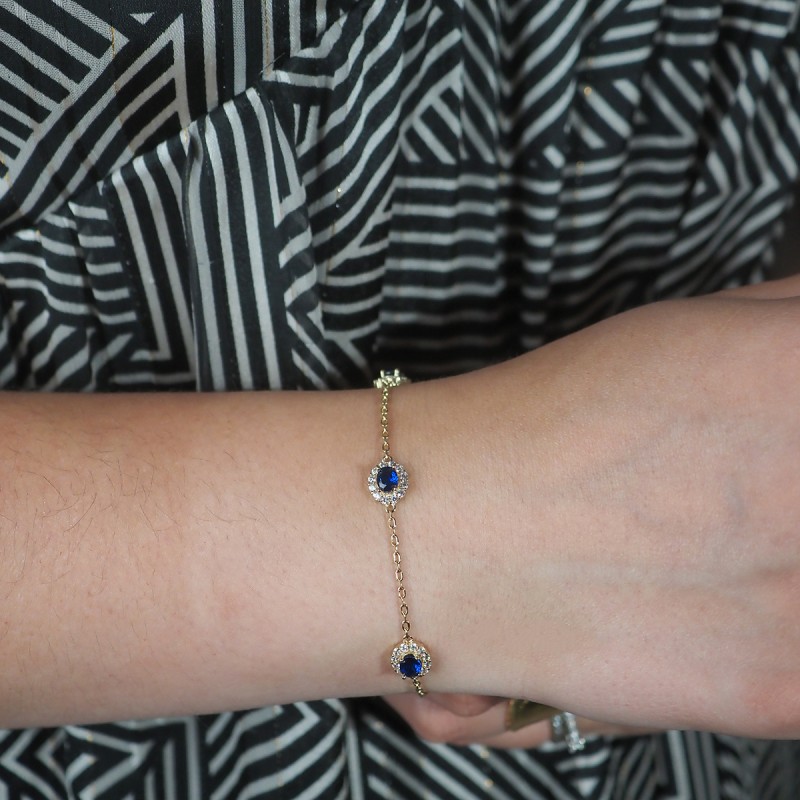 Bracelet fantaisie femme carador en plaqué or avec spinelle bleu