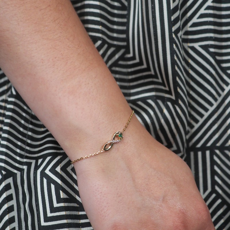 Bracelet fantaisie femme carador en plaqué or avec oxydes de zirconium et spinelle vert motif signe infini