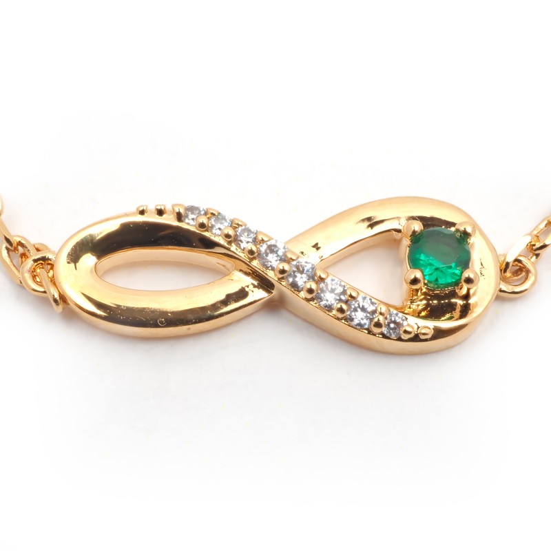 Bracelet fantaisie femme carador en plaqué or avec oxydes de zirconium et spinelle vert motif signe infini