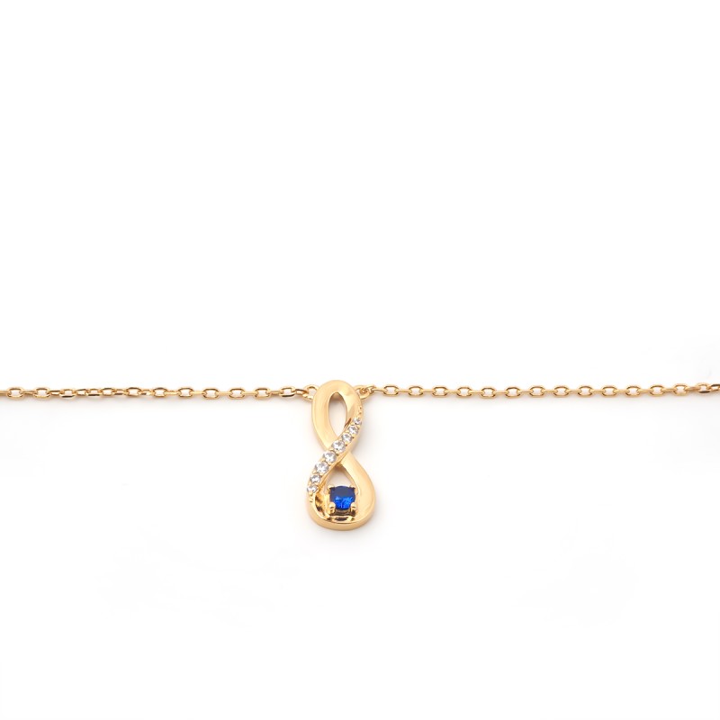 Collier fantaisie signe infini femme carador en plaqué or avec oxydes de zirconium et spinelle bleu