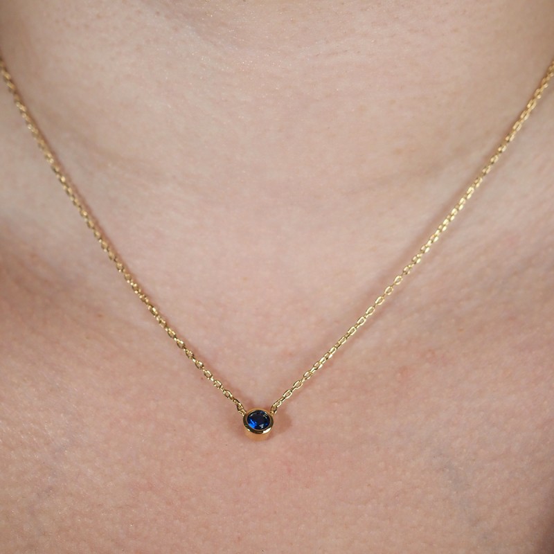 Coller solitaire femme carador en plaqué or avec spinelle bleu serti clos