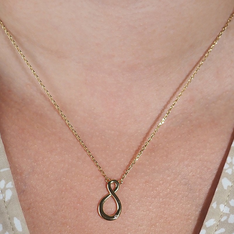 Collier fantaisie femme carador en plaqué or motif signe infini avec oxyde de zirconium