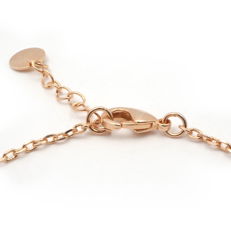 Bracelet fantaisie deux anneaux entrelacés femme carador en plaqué or avec oxydes de zirconium et céramique blanche