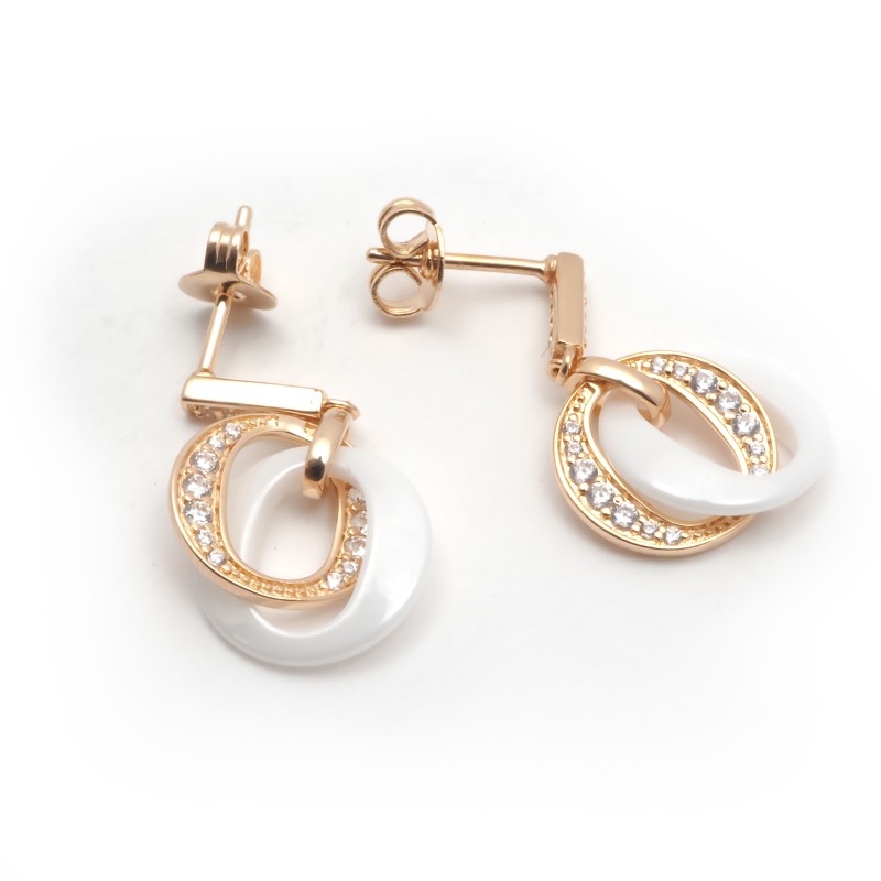 Boucles d'oreilles fantaisie carador en plaqué or avec oxydes de zirconium et céramique blanche