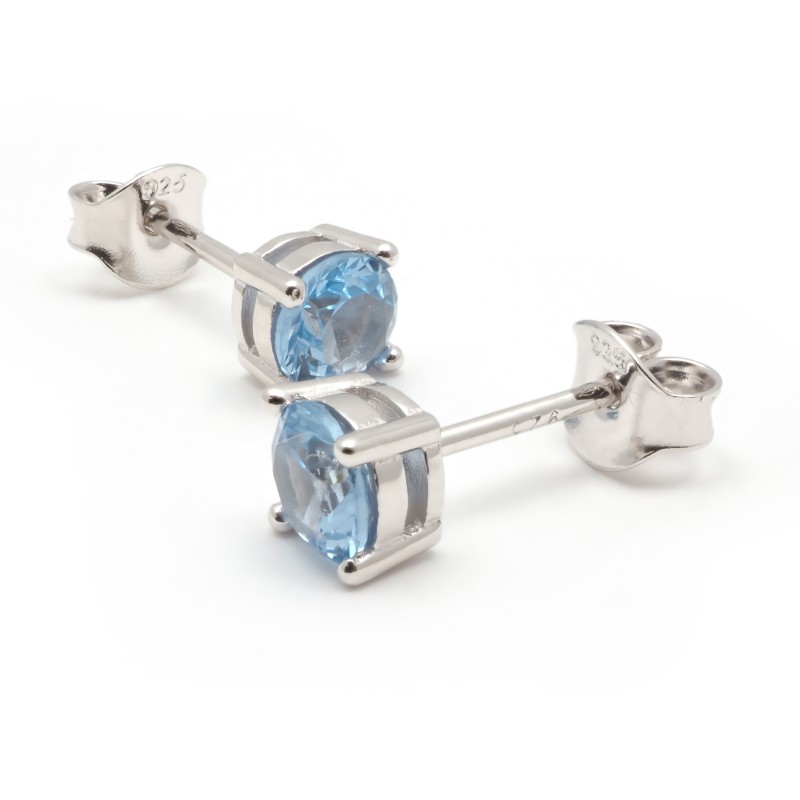 Boucles d'oreilles clous Carador en argent  et spinelle bleu clair serti 4 griffes