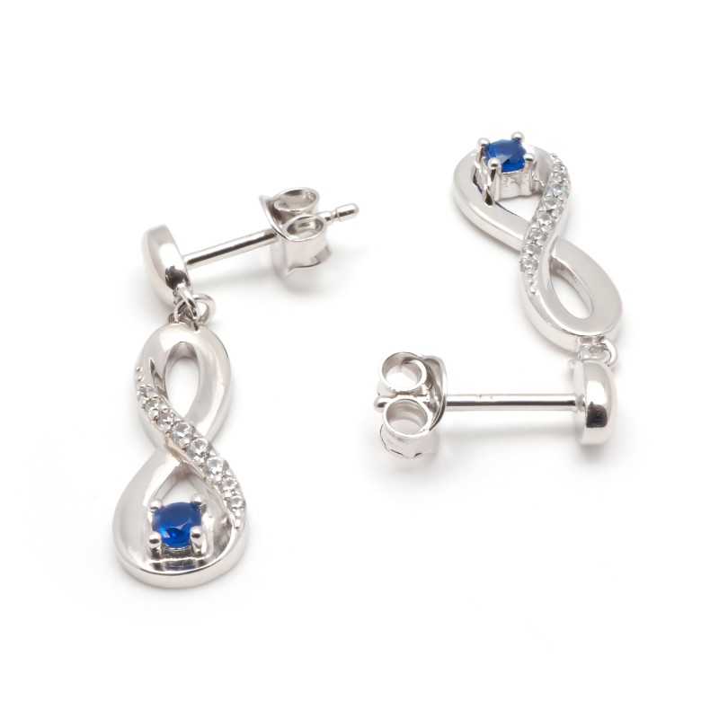 Boucles d'oreilles pendantes Carador en argent  et  oxydes de zirconium et spinelle bleue motif infini