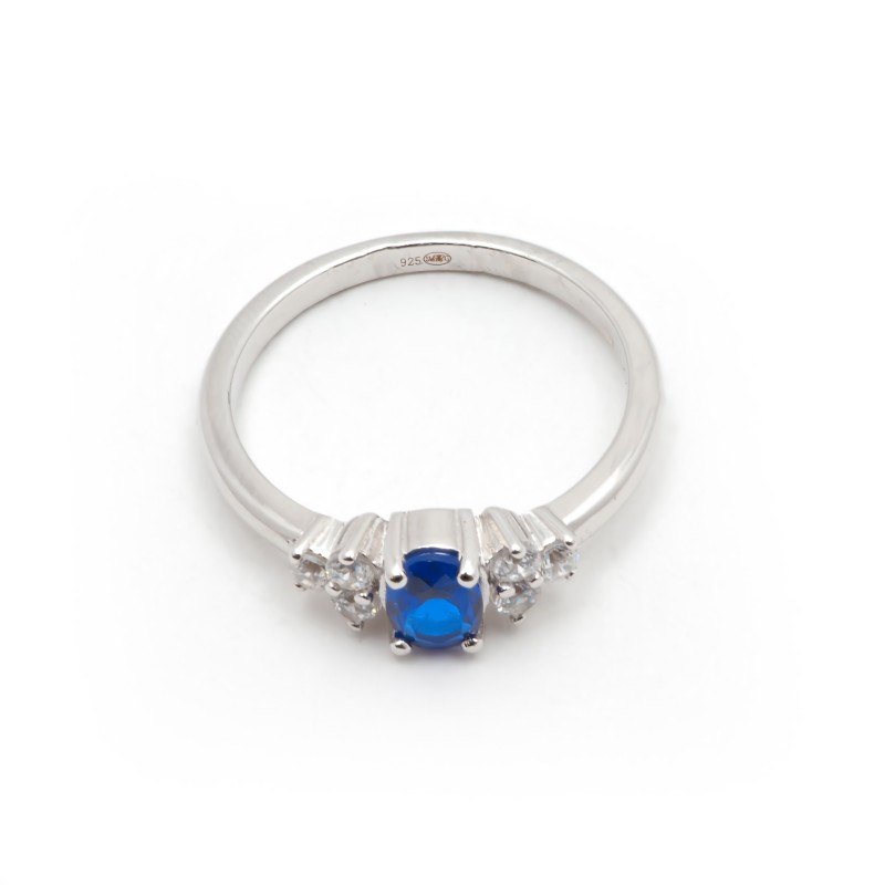 Bague solitaire accompagné femme carador en argent avec spinelle bleue foncée et oxydes de zirconium