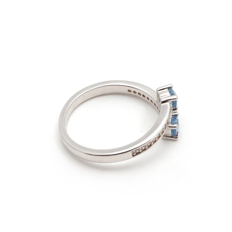 Bague fantaisie femme carador en argent avec 2 spinelles bleues serties 4 griffes et oxydes de zirconium