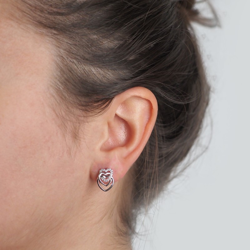 Boucles d'oreilles Clous Carador en argent  et oxydes de zirconium motif 3 coeurs entrelacés