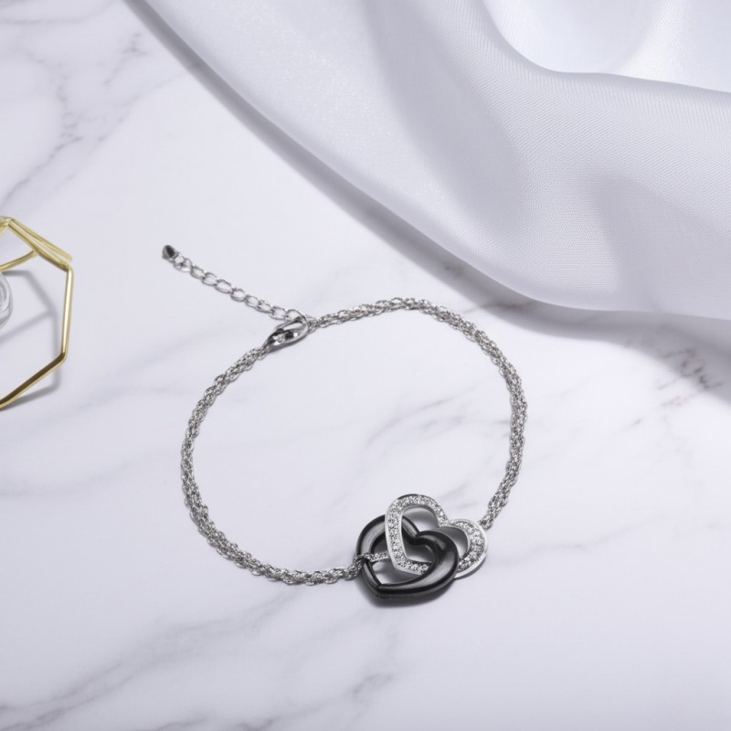 Bracelet femme Carador en argent double cœur avec oxydes de zirconium et céramique noire