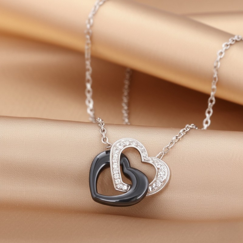 Collier femme carador en argent doubles cœurs avec oxydes de zirconium et céramique noire