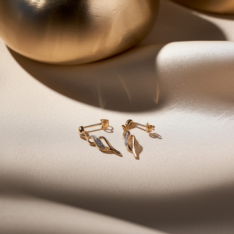 Boucles d'oreilles pendantes diamants et or 375/000