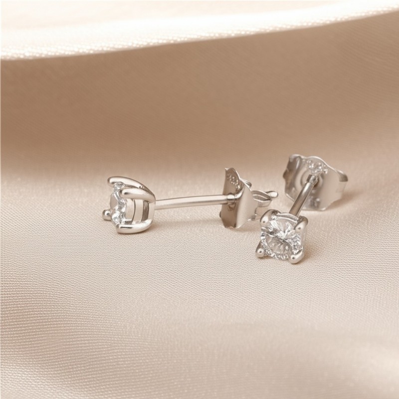 Boucles d'oreilles solitaire or  blanc 750/000 et diamant