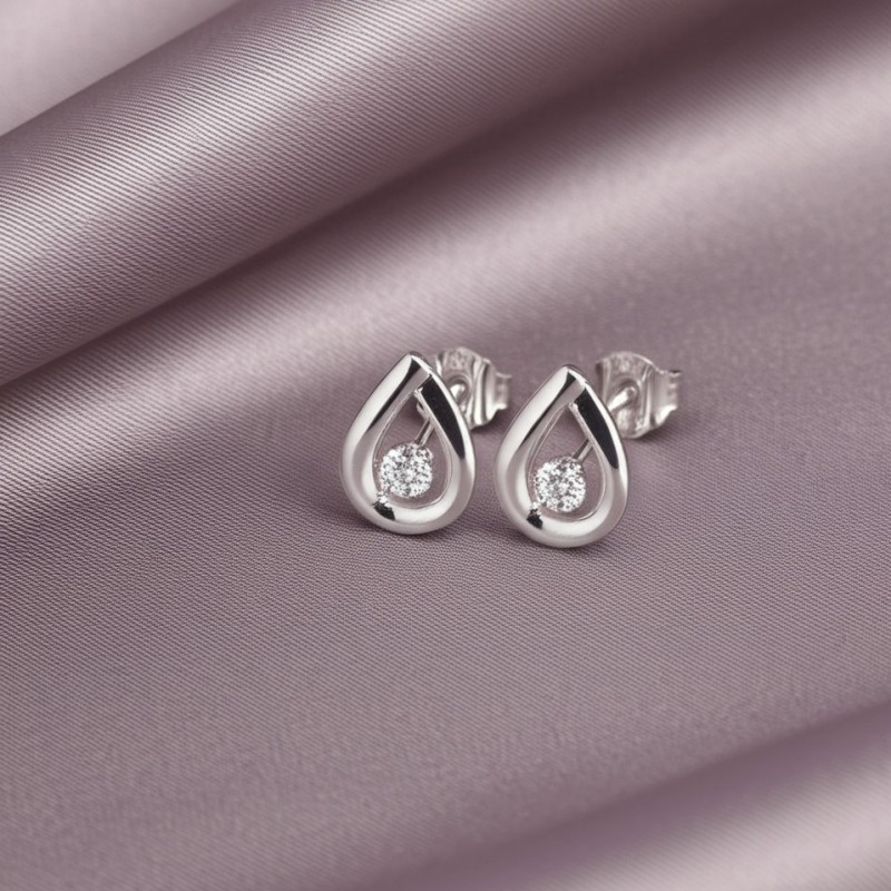 Boucles d'oreilles en or blanc 750/000 CARADOR diamants.