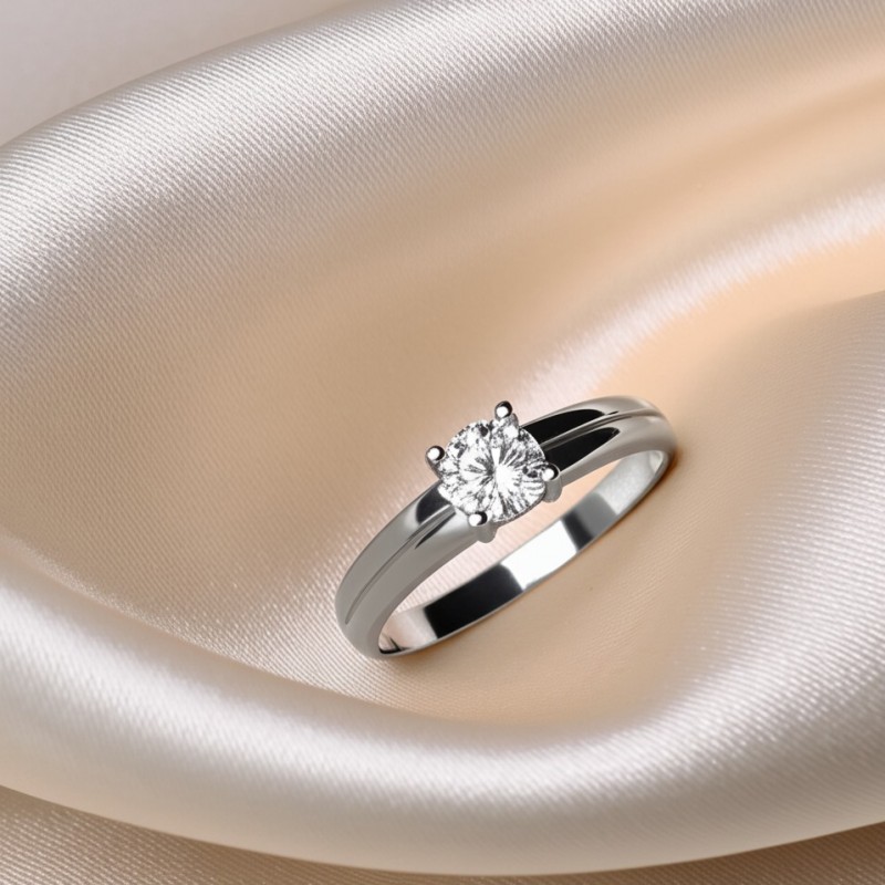 BAGUE SOLITAIRE OR BLANC 750/000 AVEC DIAMANT