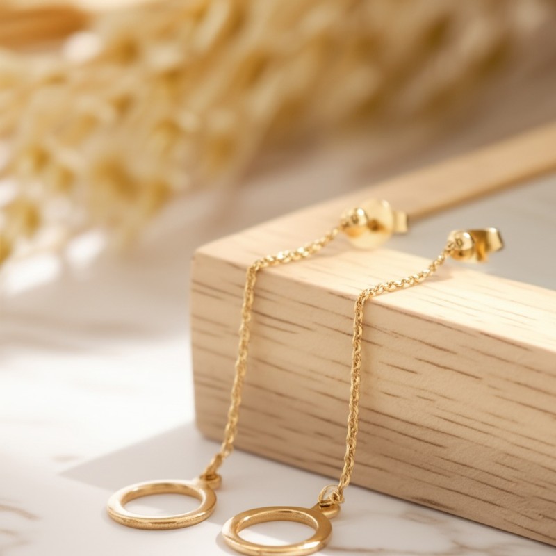 Boucles d'oreilles pendantes Carador sphère suspendue en or 375/000