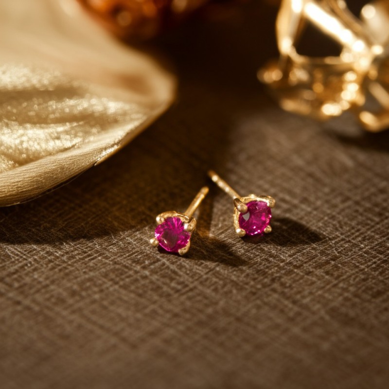 Boucles d'oreilles clous rubis 3 mm Carador en or jaune 750/00