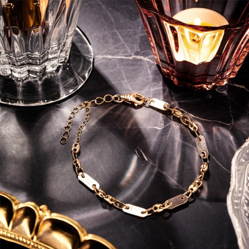 Bracelet en or jaune 750/000 CARADOR maille grain de café