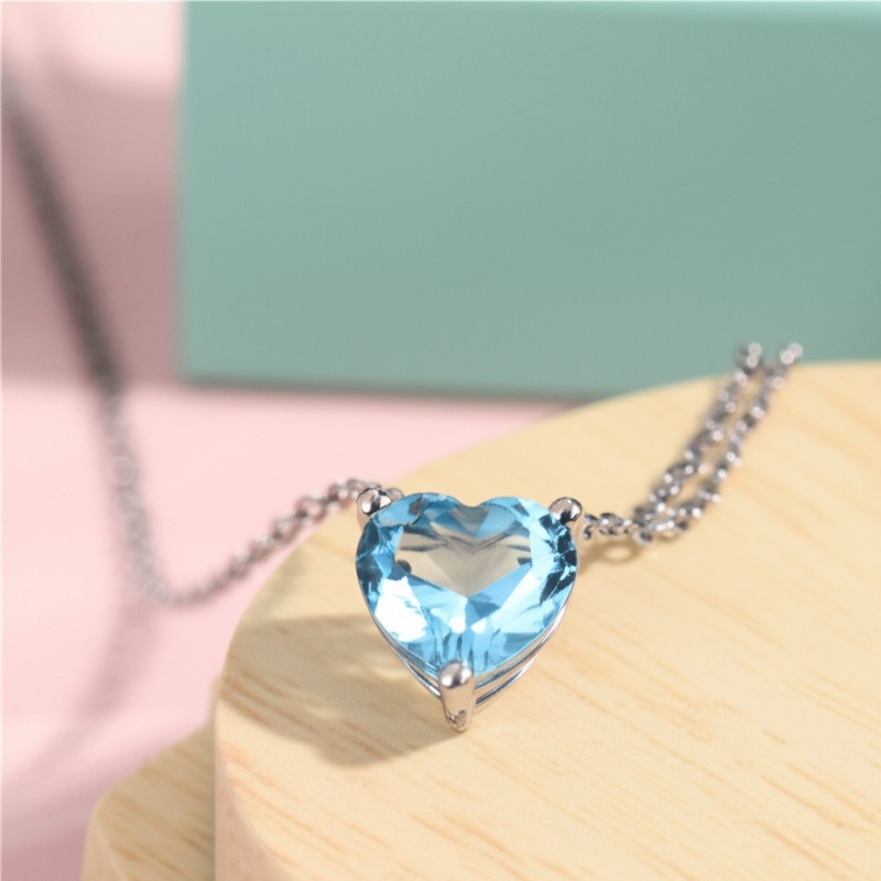 Collier Carador Or blanc 375/000e et Topaze