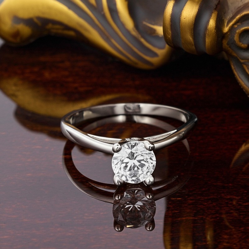 Bague solitaire  Carador en or blanc 375/000 et oxyde de zirconium serti 4 griffes