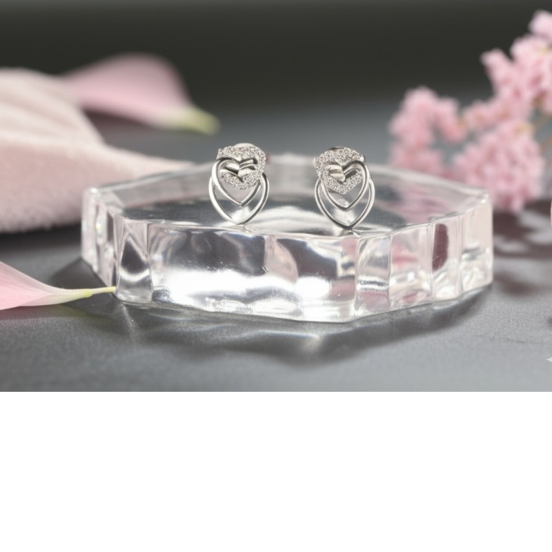 Boucles d'oreilles Clous Carador en argent  et oxydes de zirconium motif 3 coeurs entrelacés