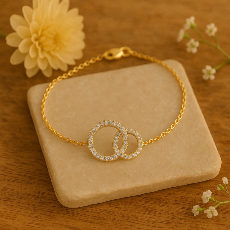 Bracelet Carador cercles enlacés pavé d'oxydes de zirconium plaqué or