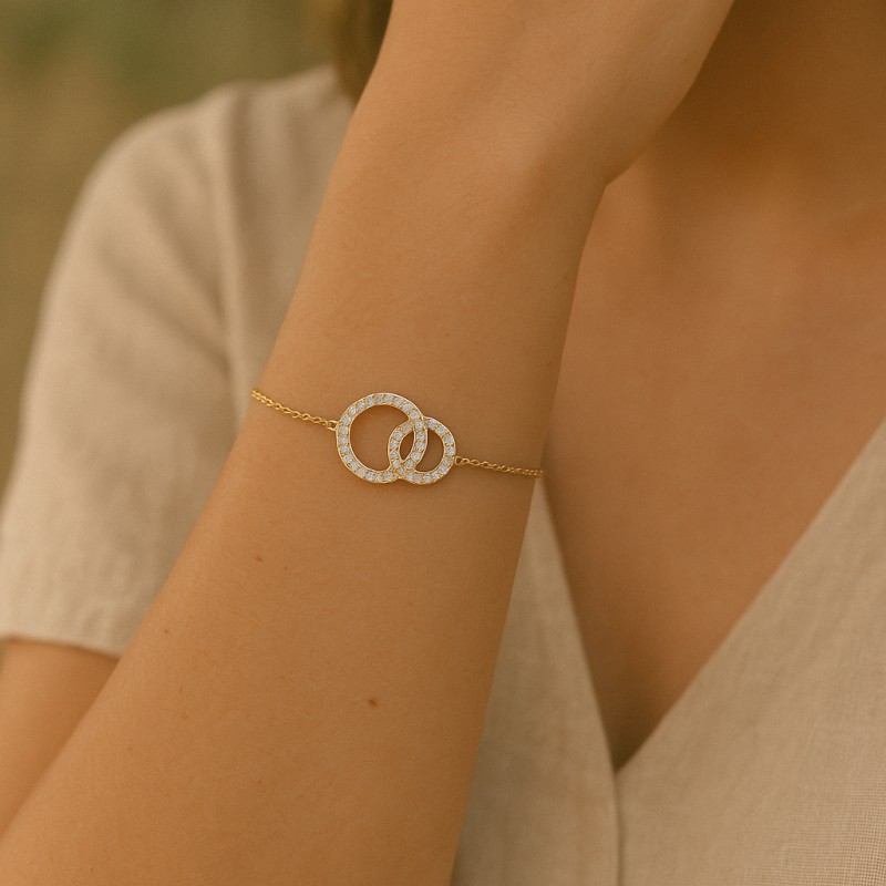 Bracelet Carador cercles enlacés pavé d'oxydes de zirconium plaqué or